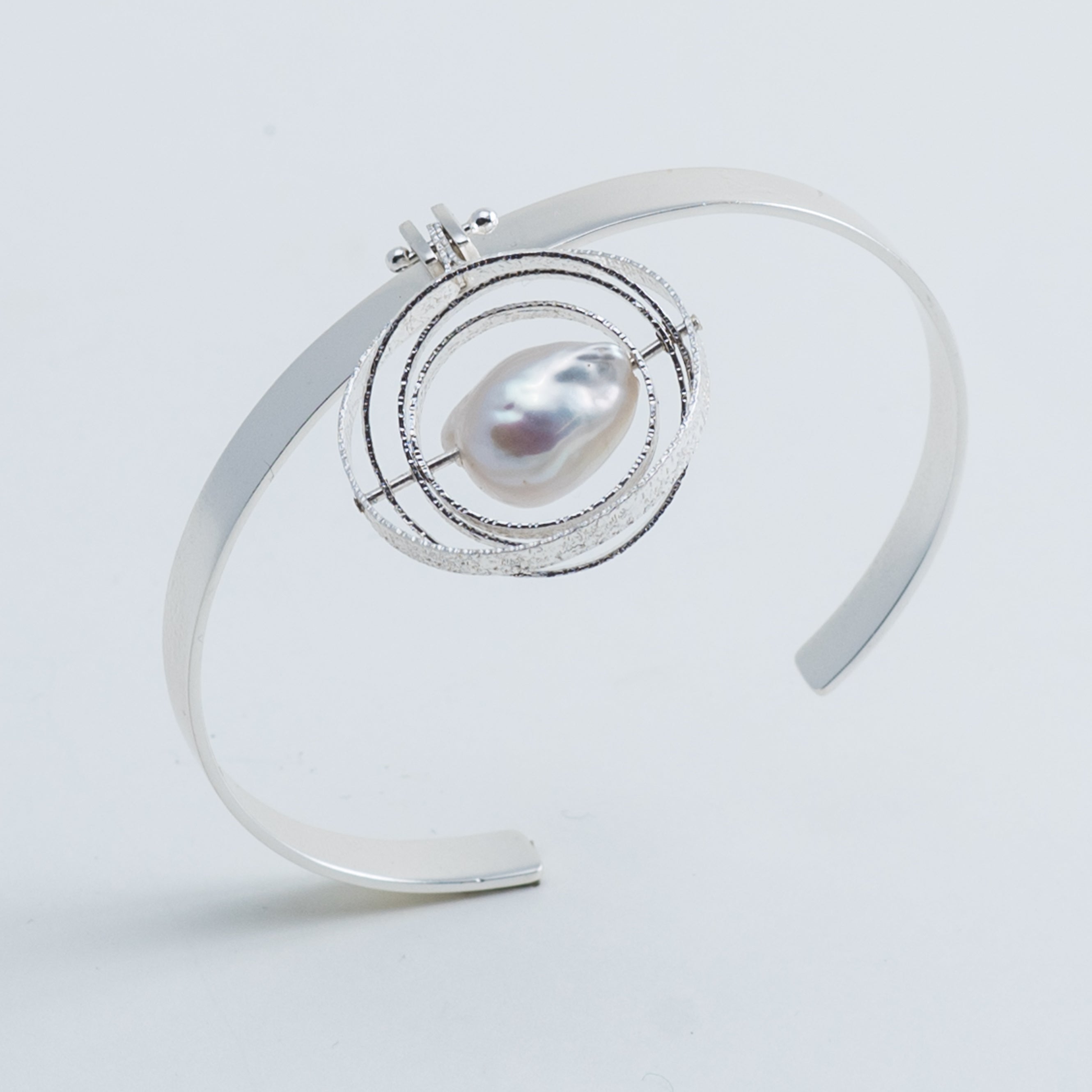 Bracciale cinetico con perla